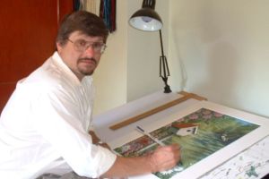 Larry Smail at drawing board